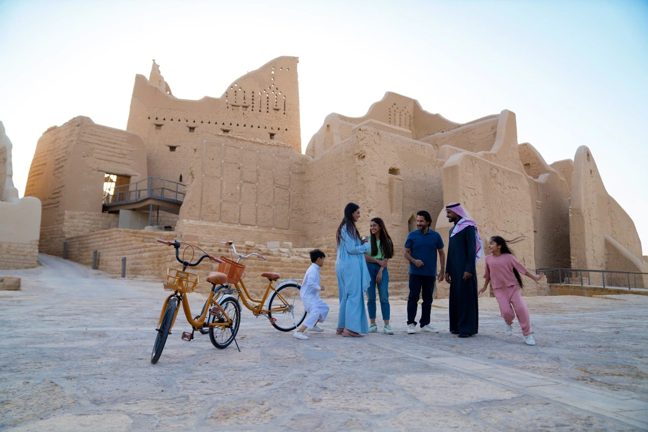 A family enjoying a day out in the At Turaif district in Diriyah. STA