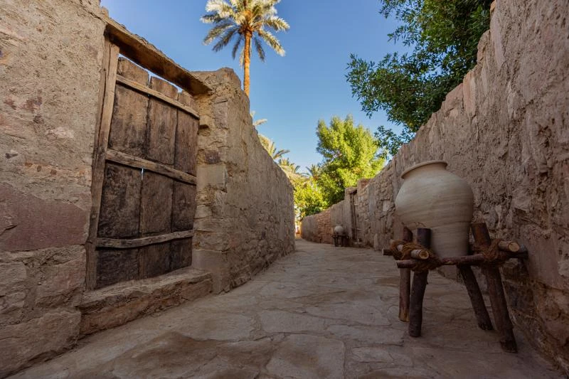 Ancient walls lining a pathway at Tayma
